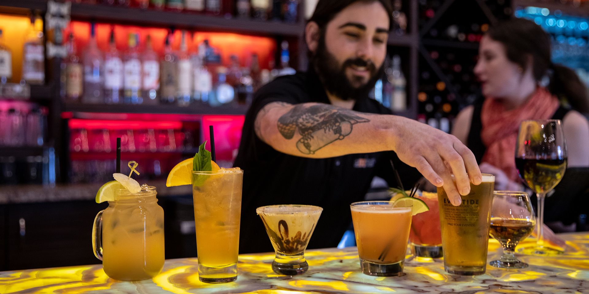Bartenders making drinks at Ember